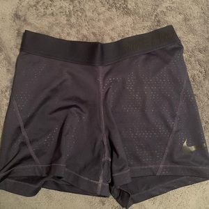 Nike pros navy with dots. Size small.
